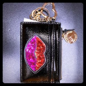 Victoria’s Secret change purse/ keychain.